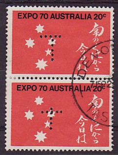 1970 - 20c Expo vertical pair - note varying &quot;registration&quot; of the perfin - rated S